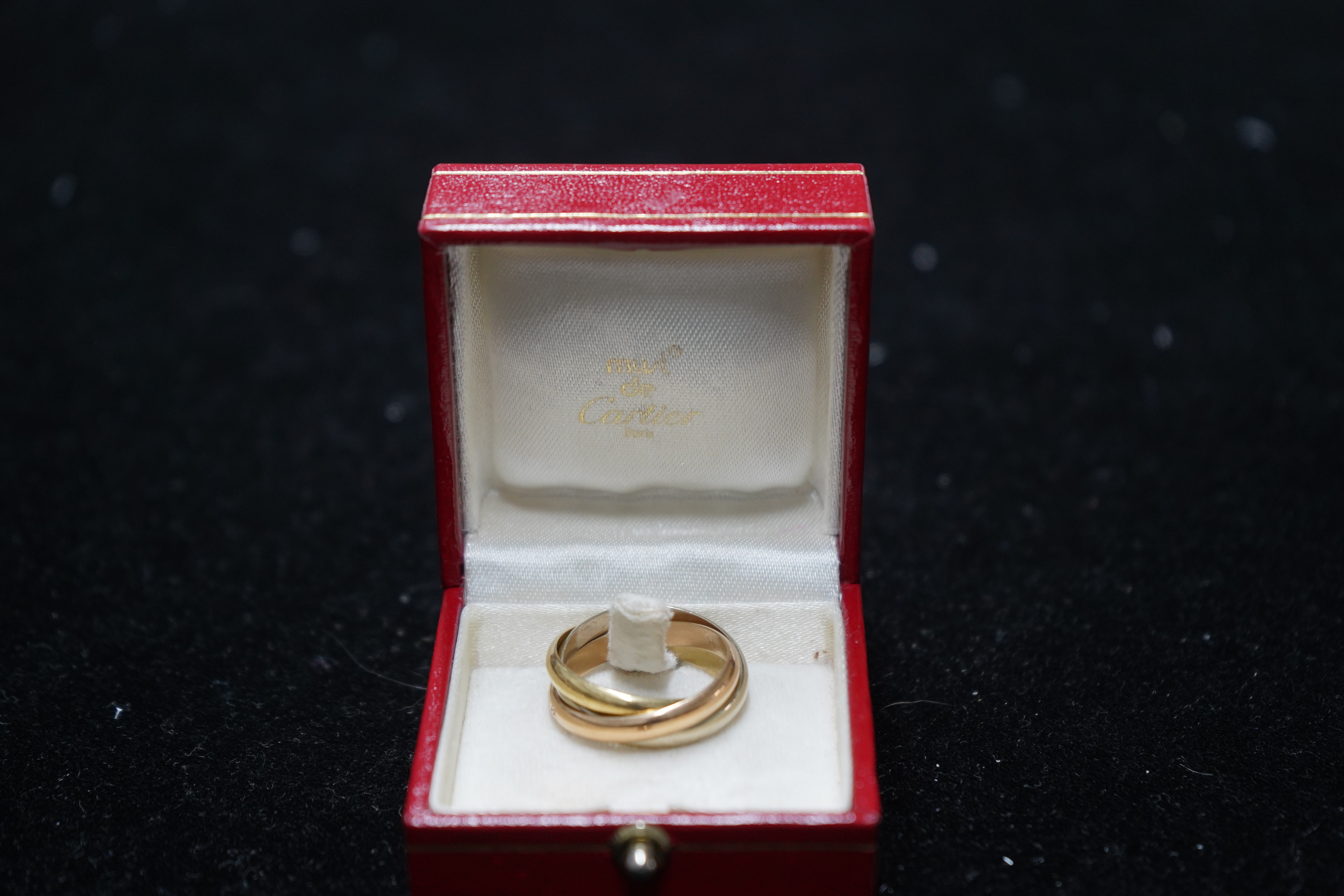 A modern Must De Cartier three colour 18k gold triple band 'Russian' wedding ring